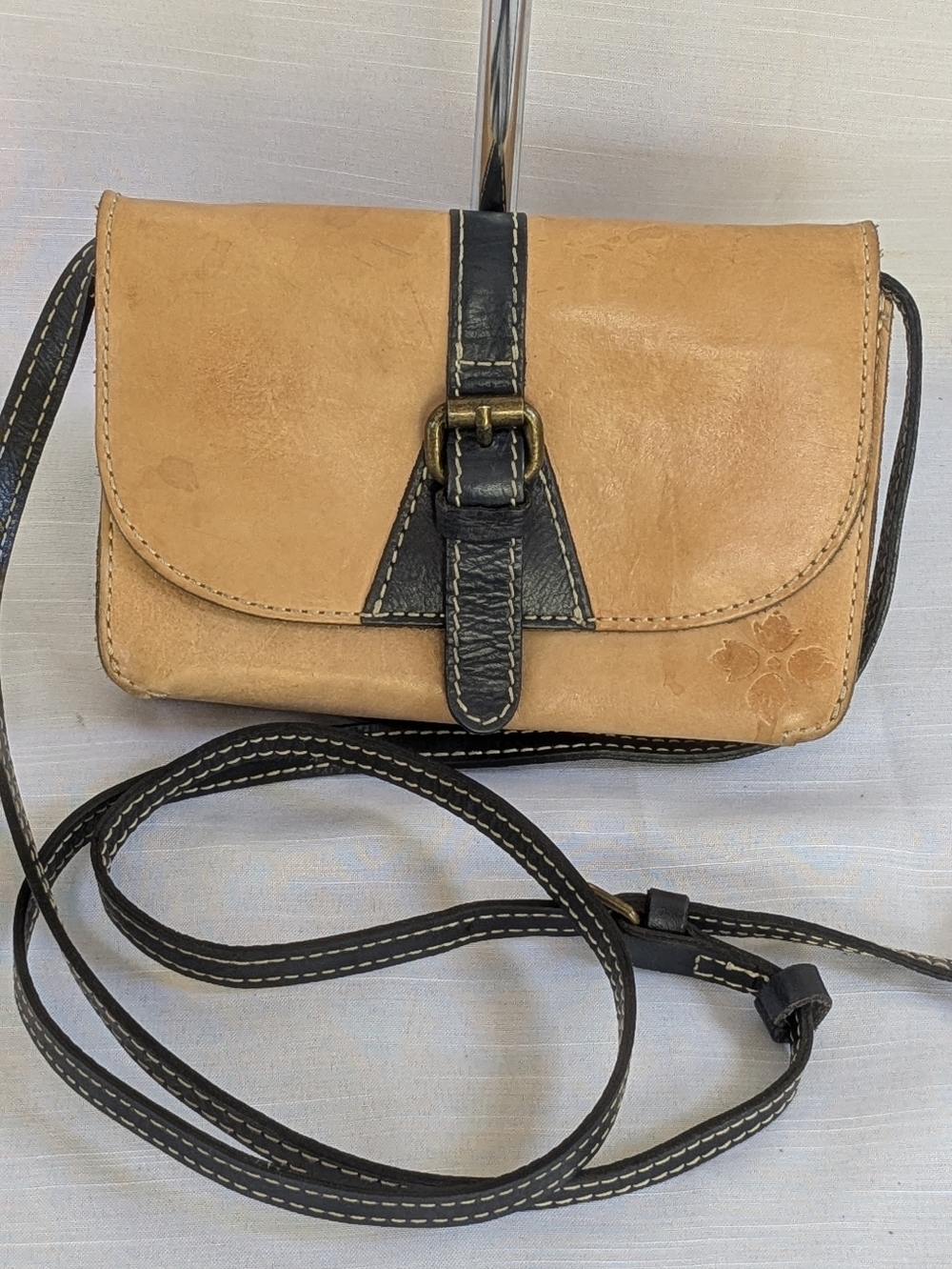 Patricia Nash Torri crossbody bag, crafted from tan leather